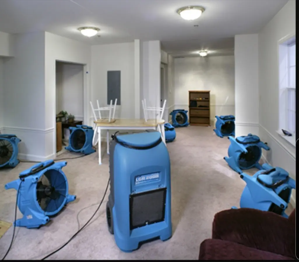 Air movers and dehumidifier setup for Water Damage Restoration in Artesia